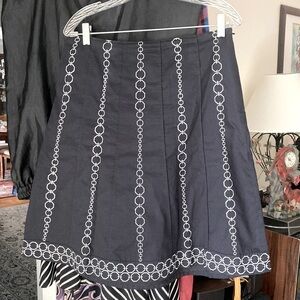 A line embroidered skirt.